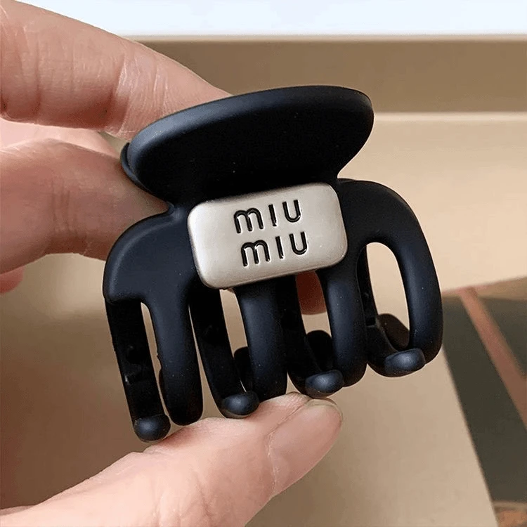 气质抓夹女2024新款丸子头后脑勺半扎高马尾夹头饰黑色磨砂字母