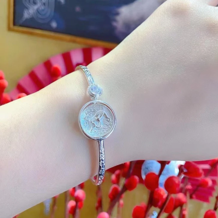 钛钢手镯  手工艺品  四面象可旋转手镯