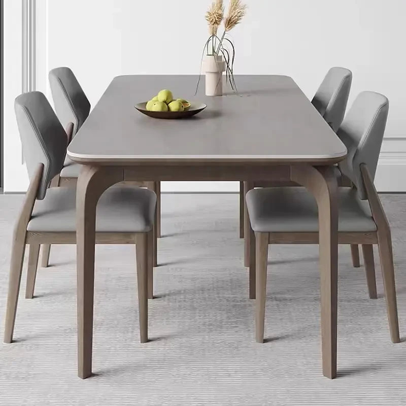 北欧新款长方形实木岩板餐桌椅组合家用大小户型进口餐厅吃饭桌子