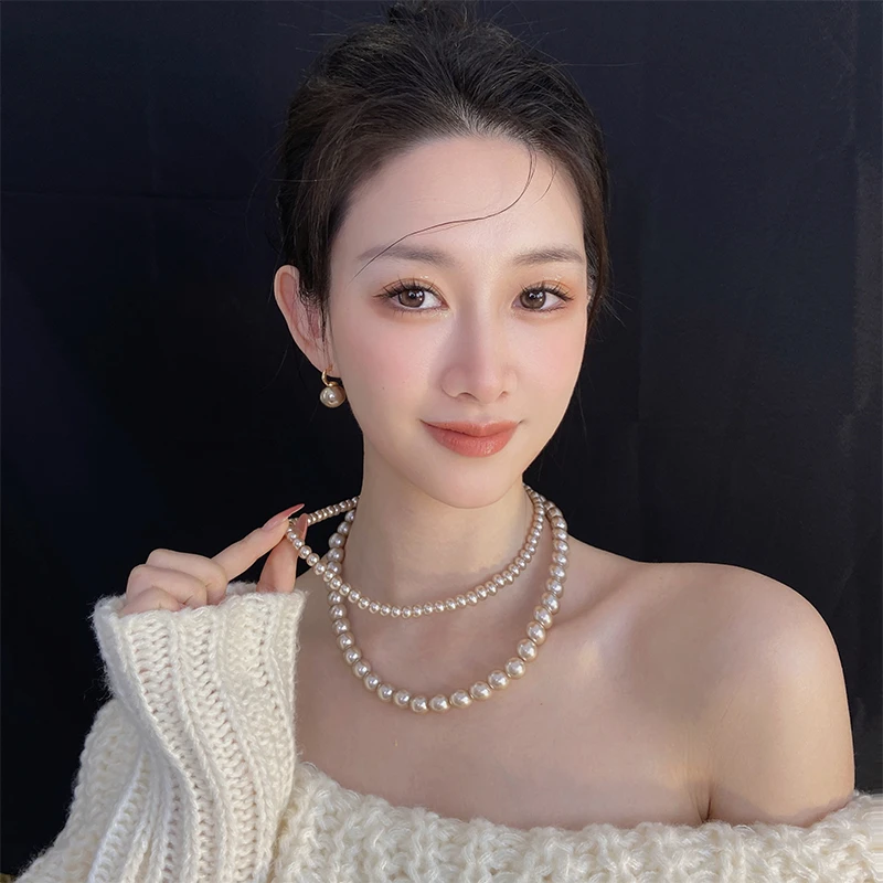 合金仿珍珠项链 香槟色秋冬项链女小众轻奢高级感颈链毛衣链