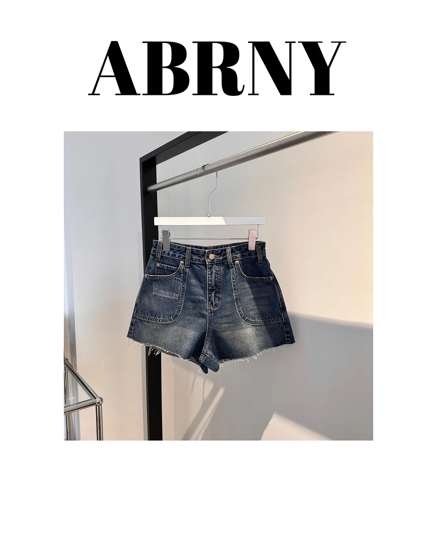 许小黑【减龄短裤】毛边设计感蓝色无弹牛仔短裤7298