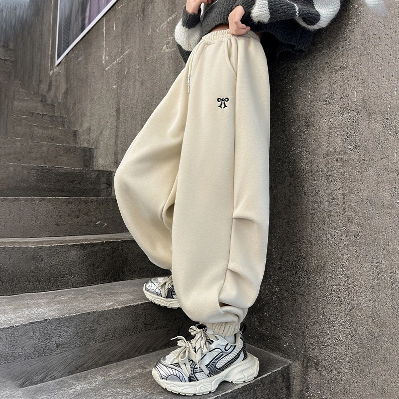 女童冬季加绒裤子2024新款6-12岁中大童防寒保暖蝴蝶结加绒卫裤潮