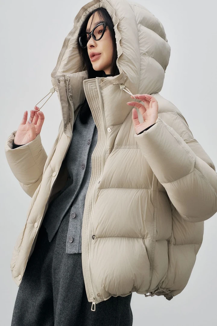 KEMI时尚爆款（三星安心绒）88M21羽绒服衣长60左右