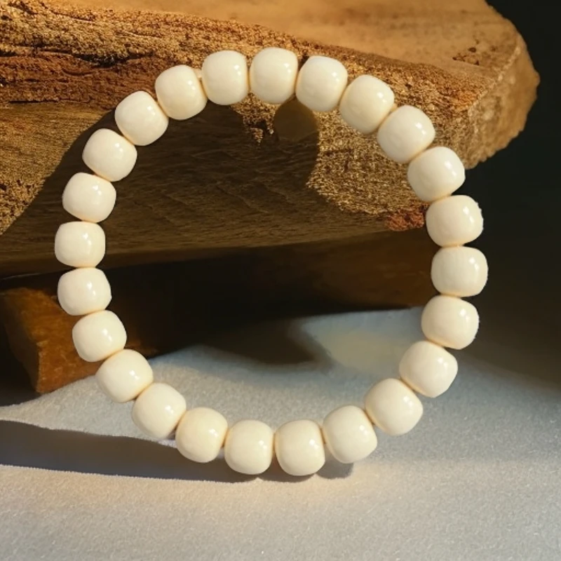 W825天然猛犸牙9*8老型手串