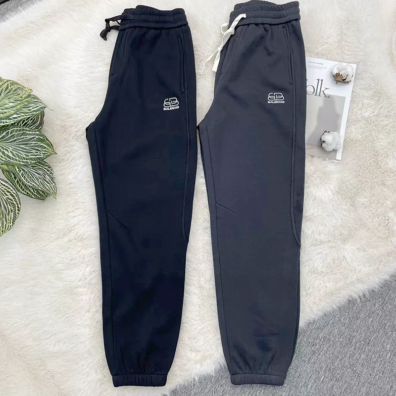 秋冬宽松休闲裤时尚加绒加厚潮流裤子纯色运动百搭小脚弹力卫裤男