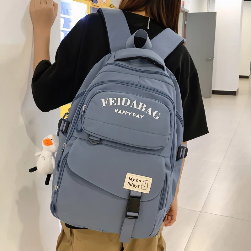 可套拉杆2023新款多层大容量双肩包高中生大学生初中生护脊书包女