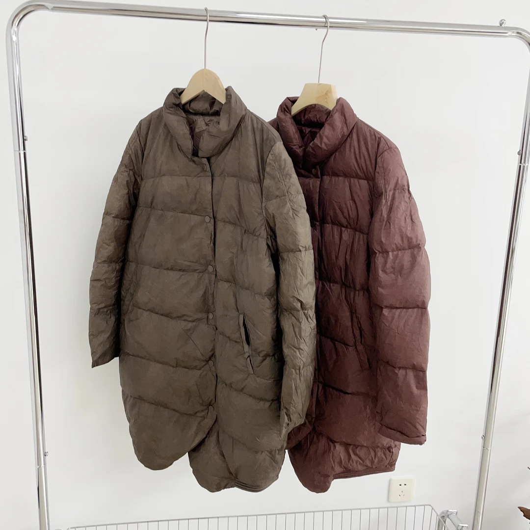 M111 文艺风立领立领下摆弧度轻薄休闲羽绒服