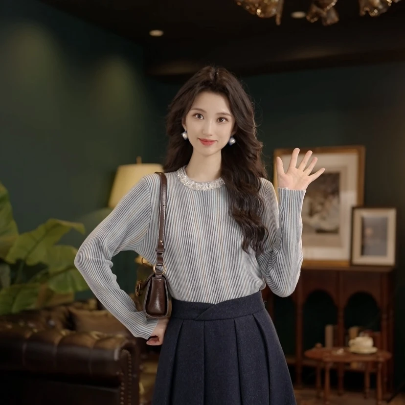 琦琦【冬日特调】港风复古长袖宽松百搭打底上衣YS1114090