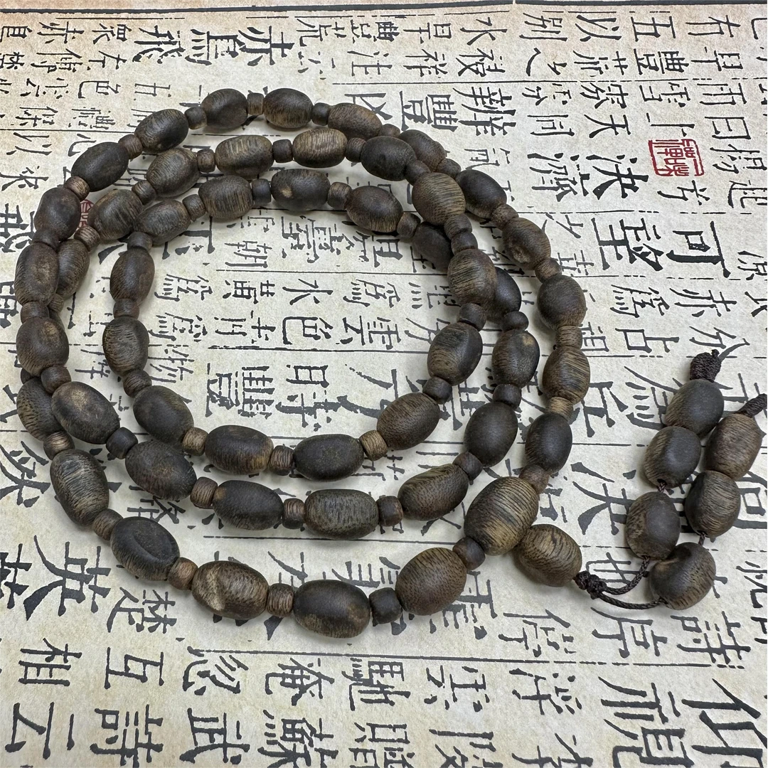 孤品沉棋楠留疤老料0.9多圈手串