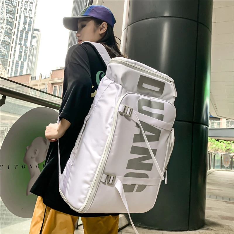 大容量滑雪背包多功能雪板包双肩运动收纳包雪鞋单板斜挎包饺子包