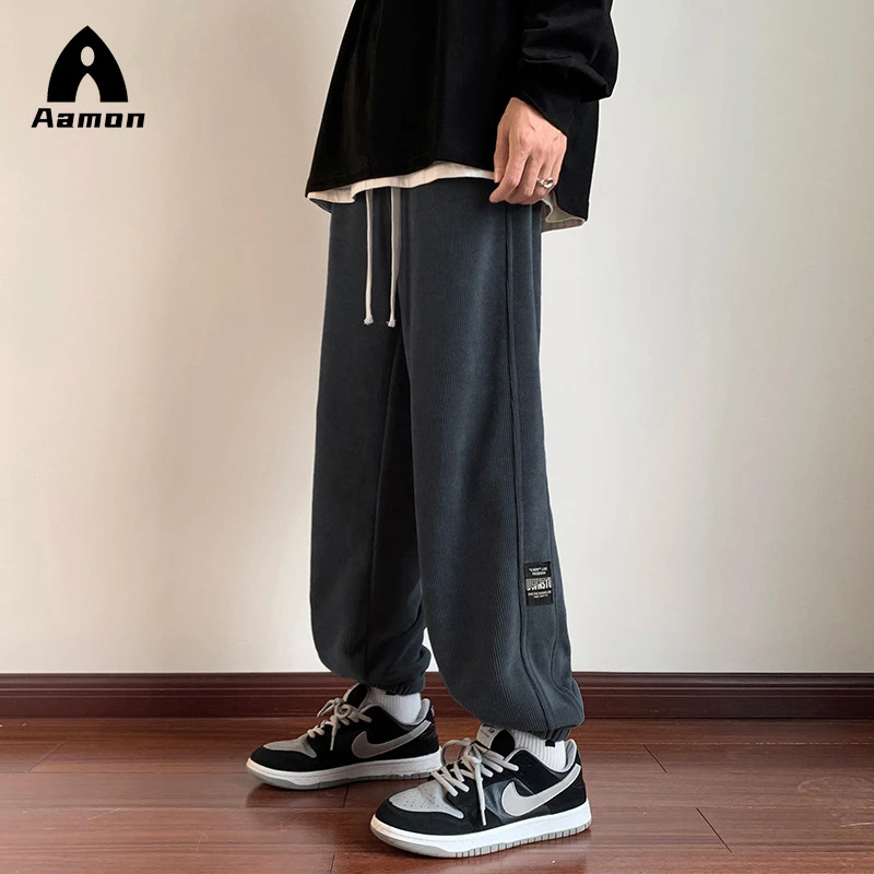 2023秋冬男士芯绒休闲裤新款潮流松紧腰字母刺绣束脚裤百搭宽松