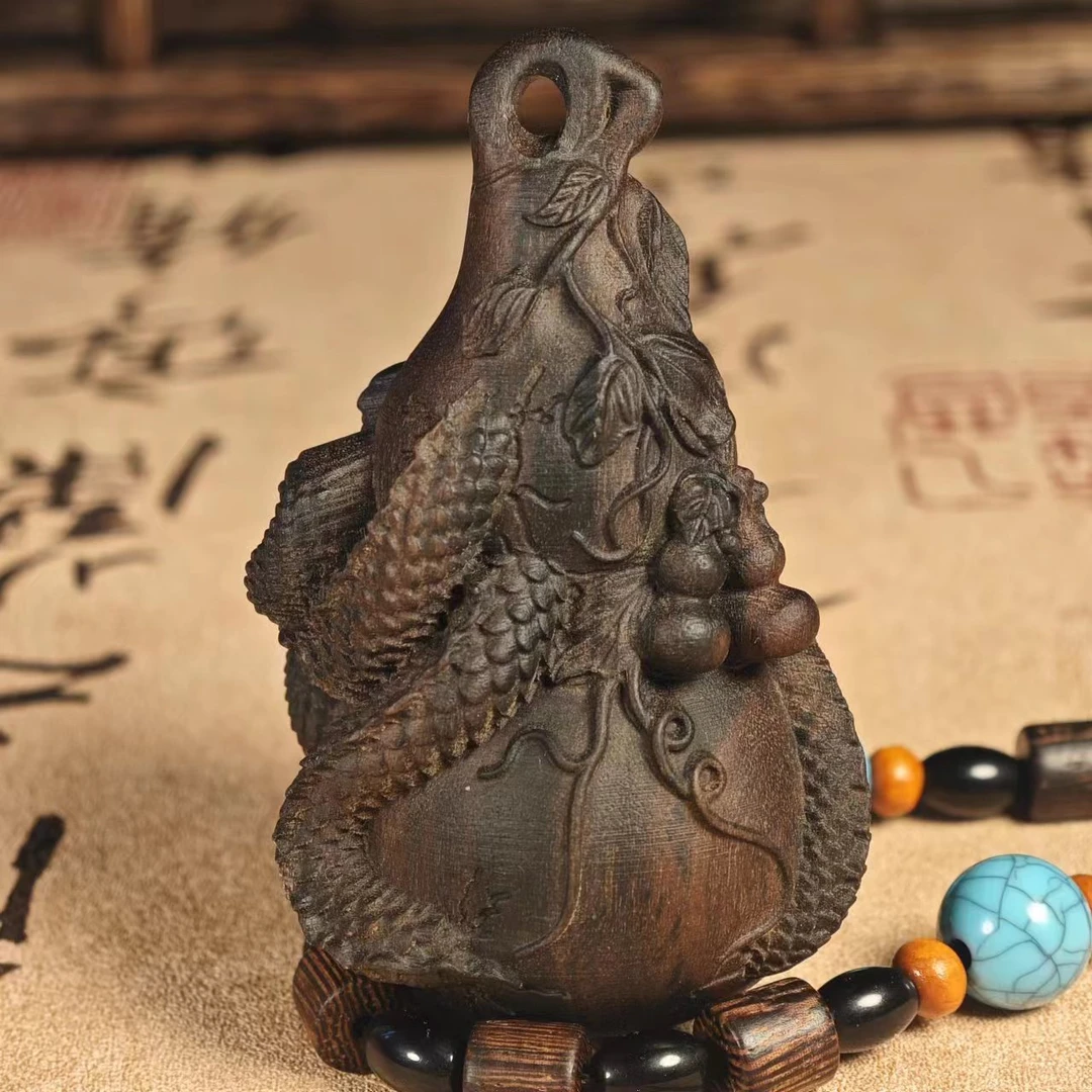 7.5cm印尼达拉干木雕手把件盘龙葫芦木质随身盘玩文玩工艺品