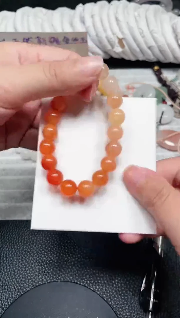 【闪购商品】石英质玉手链未镶嵌柿子红卡10