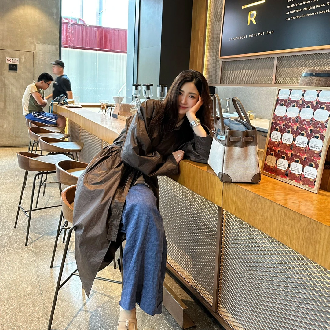 ROMI STUDIO“棕标甄选”哑光涂层压胶棉腰带廓形风衣 431F6022