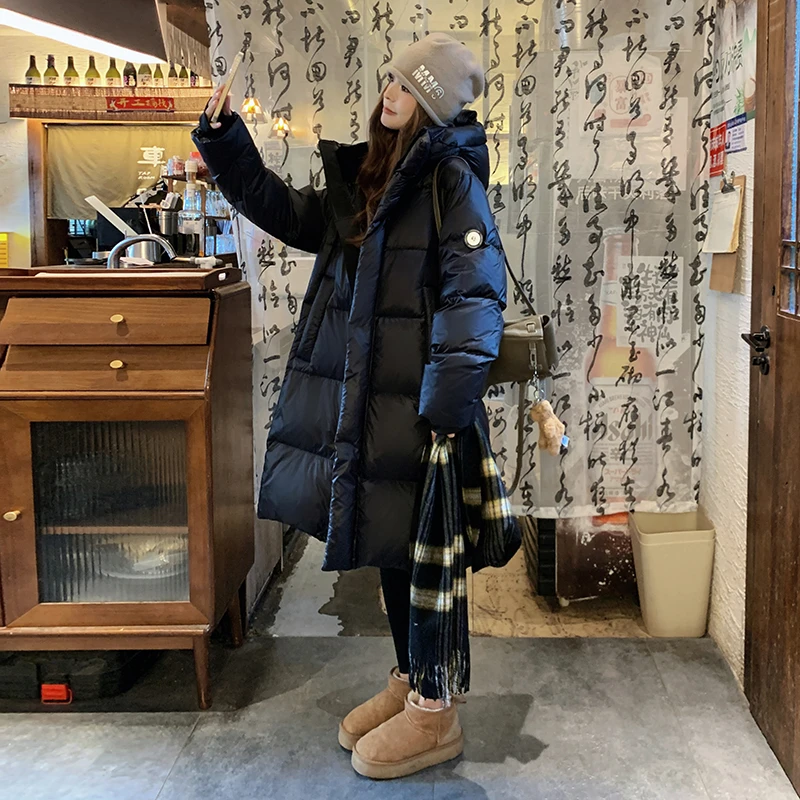 黑色中长款宽松加厚鹅绒羽绒服女2024冬季新款韩系爆款超好看外套