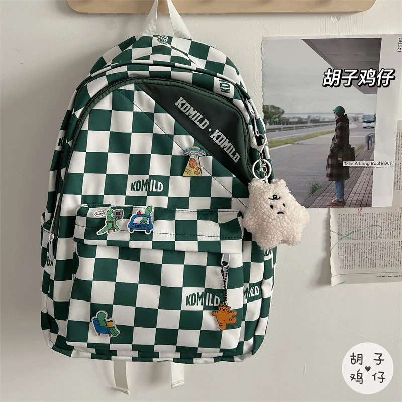 书包女大容量双肩包韩版少女学院风棋盘格高中生大学生外出背包潮