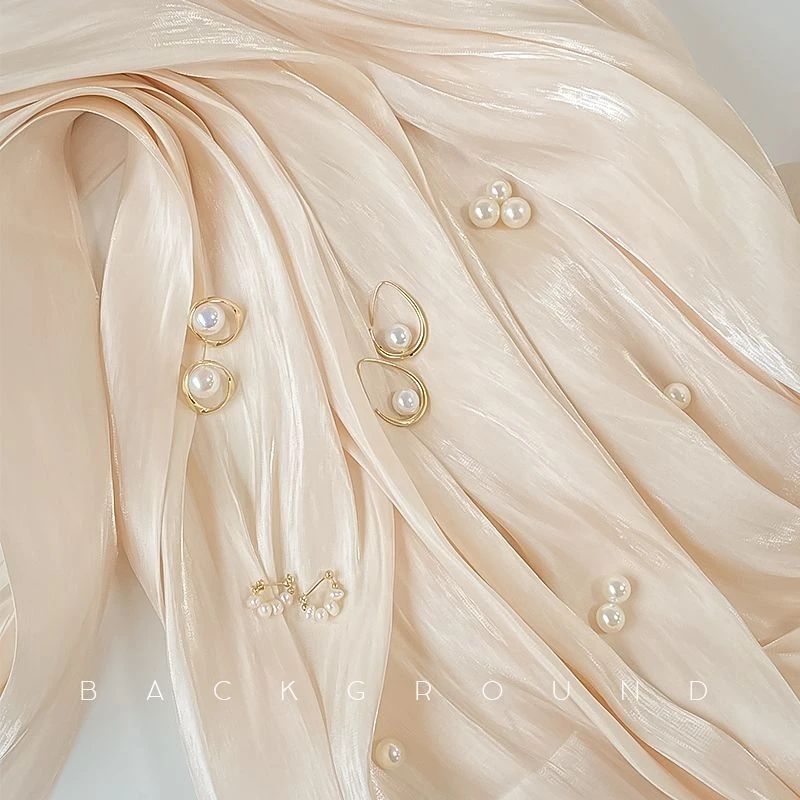 新疆包邮褶皱拍照背景布米色INS风装饰纱幔布奶白色摆拍珠宝耳环