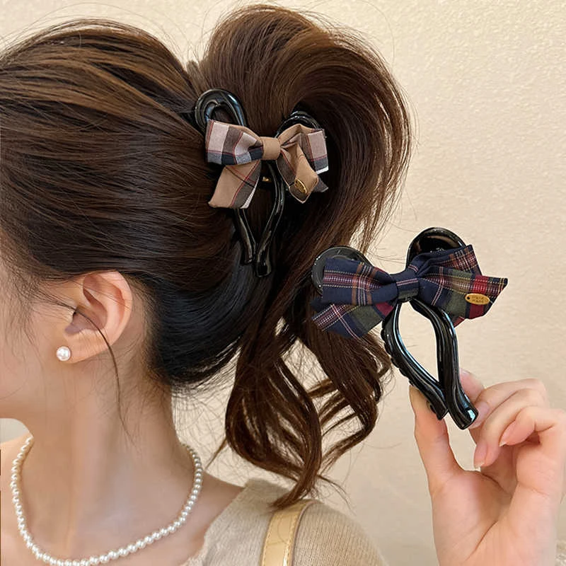 气质优雅蝴蝶结抓夹女2024新款高级感鲨鱼夹发量多网红发夹后脑勺
