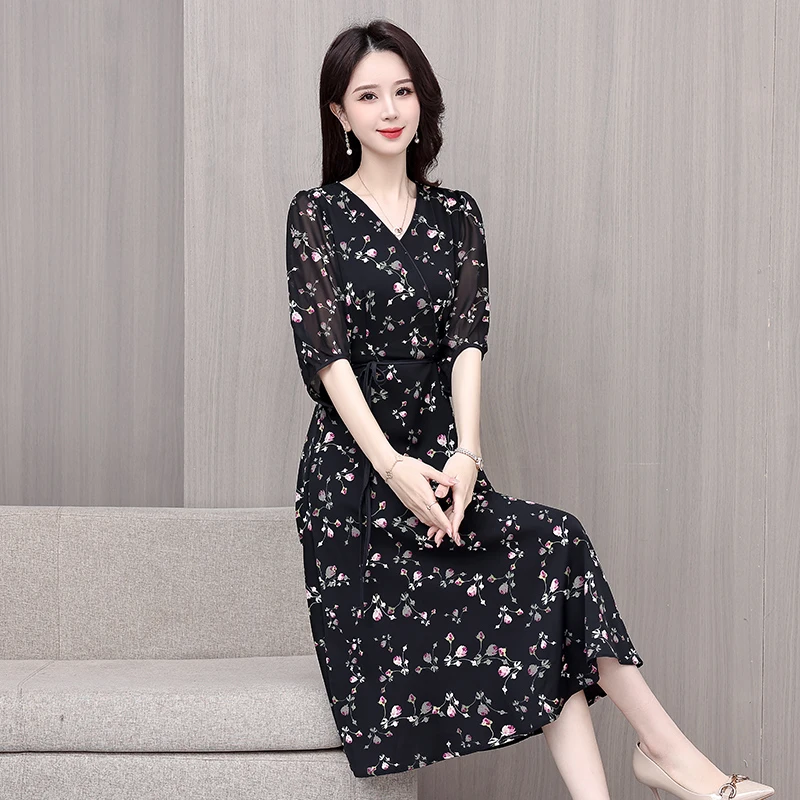 9532郁金香花黑底连衣裙女显瘦气质女神范中长款碎花减龄a字裙子