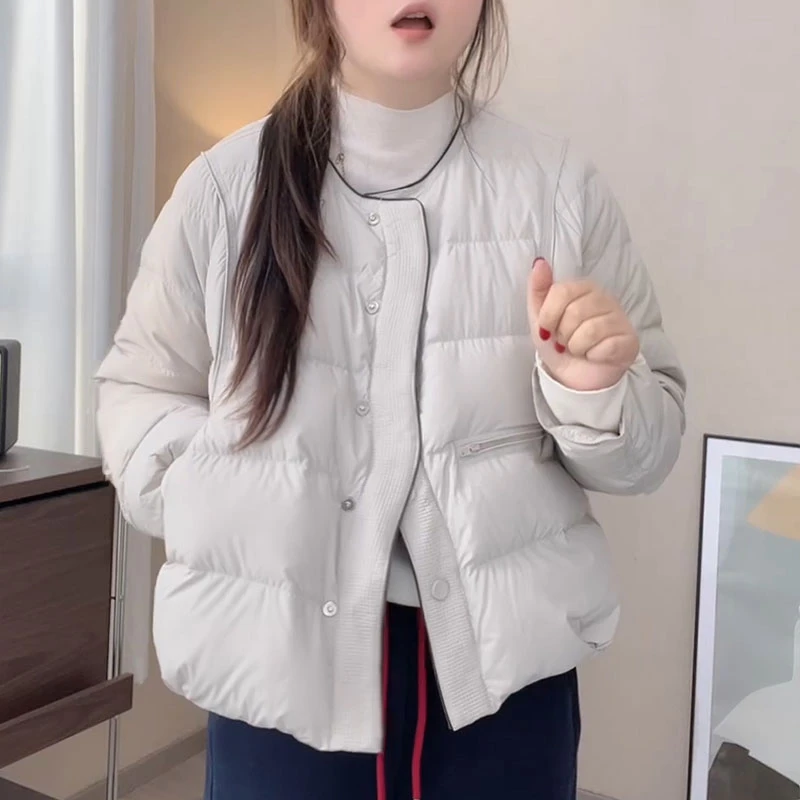 冬季简约潮流设计感单排扣保暖外套时尚小个子百搭纯色圆领羽绒服