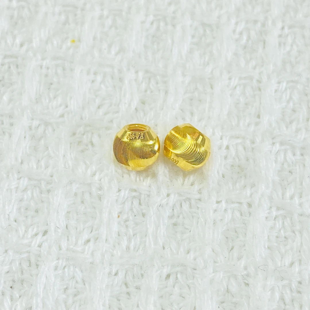 足金999 爆闪猫眼金珠一对 0.48 约卡6mm