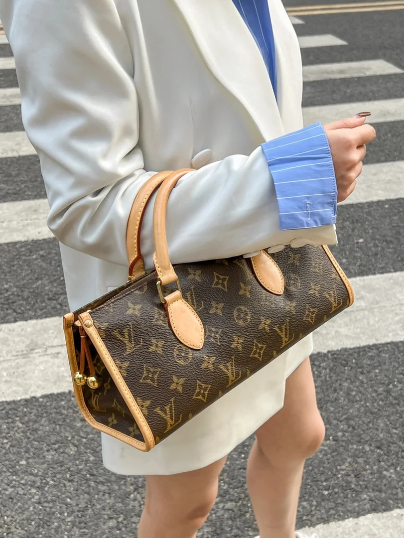 95新 LouisVuitton/路易威登 手提三角金球包    手提包
