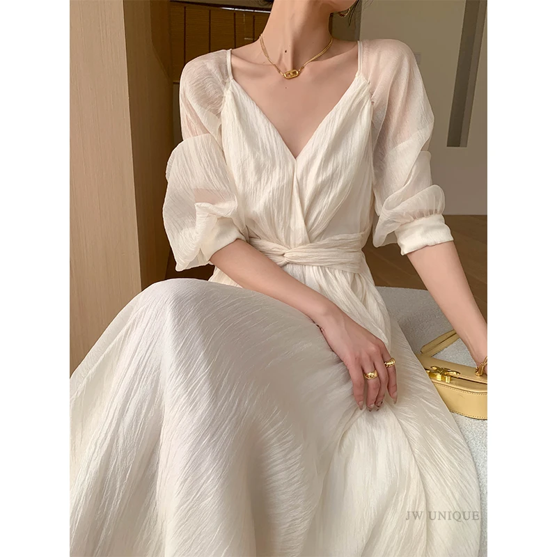 JWUNIQUE 米白色设计感长袖V领连衣裙女春季2025新款收腰显瘦长裙