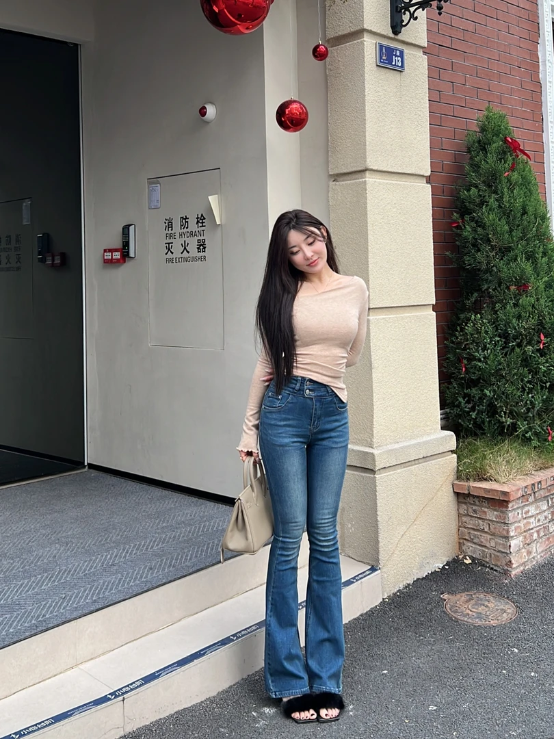 希野逸儿/韩版舒适高腰喇叭长裤女两粒扣修身显瘦复古磨白牛仔裤