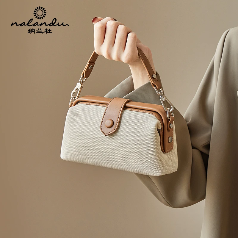 纳兰杜小包包女士2025新款高级感小众斜挎包女包百搭迷你医生包*