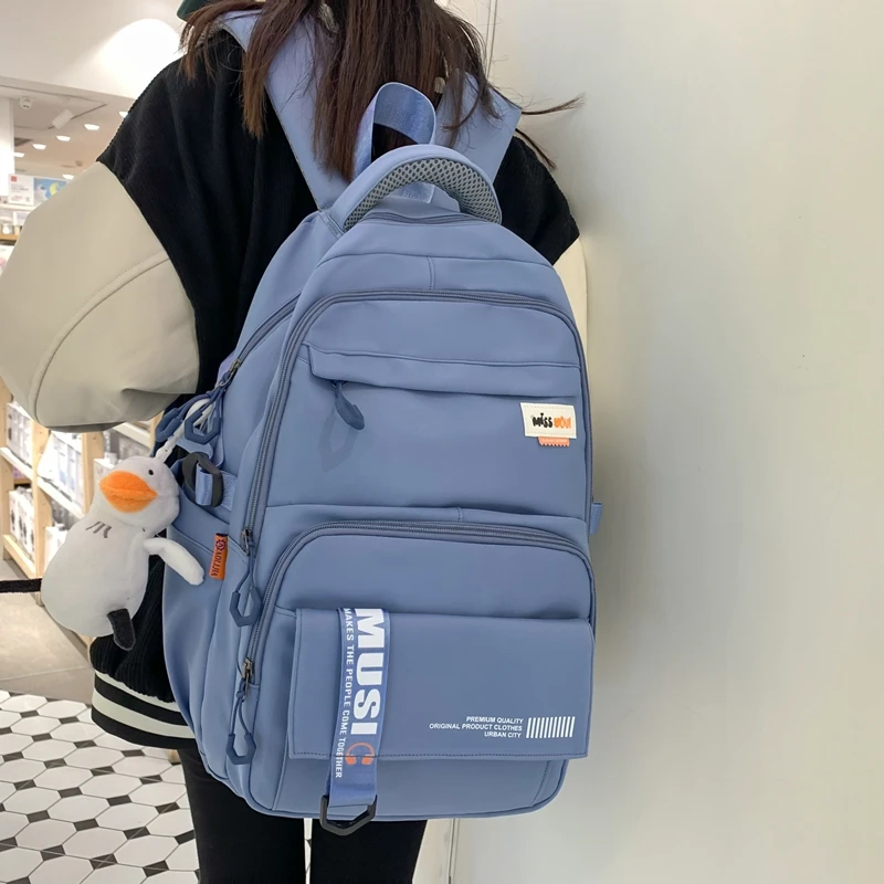 大容量初中生书包女韩版高中生小学生轻便减负结实耐用防水双肩包