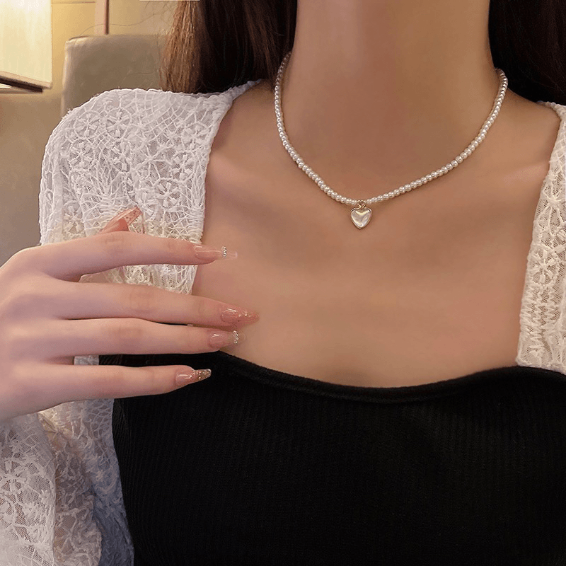 2049轻奢幻彩爱心时尚个性贝珠项链