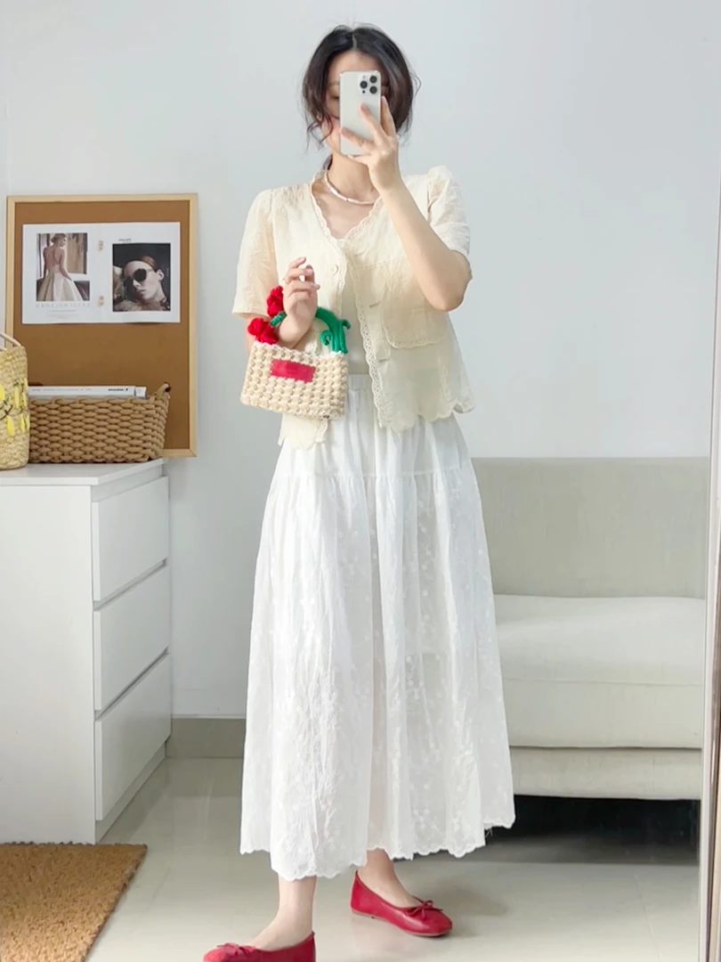 早春半身裙女高腰显瘦遮胯显腿直裙子白色刺绣仙女裙有内衬A字裙