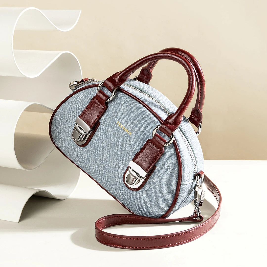 天美意女包2025新款单宁牛仔包保龄球包轻奢手提包单肩包斜挎包