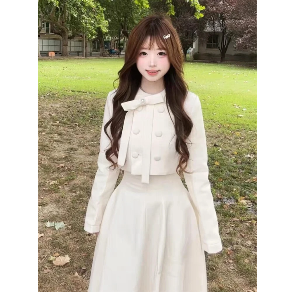 现货"南洋千金"法式珍珠蝴蝶结排扣A字廓形长半裙千金风穿搭套装