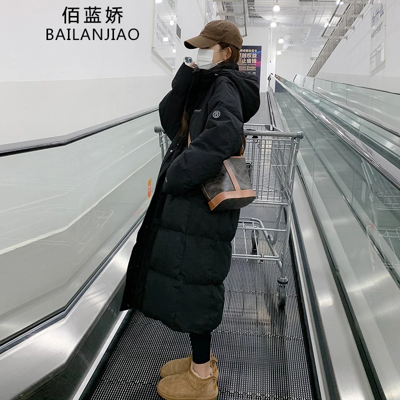 黑色长款过膝羽绒服女冬季2024中戏90白鸭绒高级感流行面包服外套