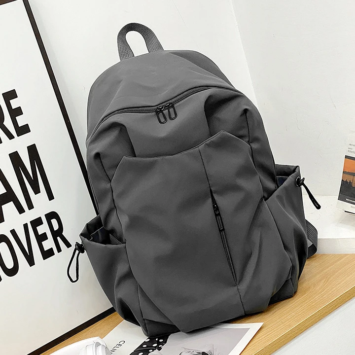 初高中大学生书包电脑包韩版休闲背包男纯色大容量质感女士双肩包
