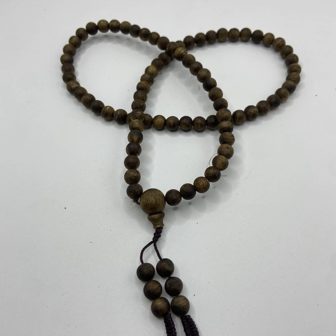 沉香99沉手持81颗圆珠