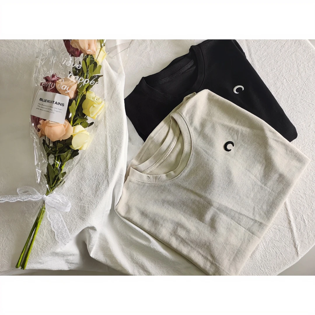 1061531休闲大版月牙T恤黑杏两色