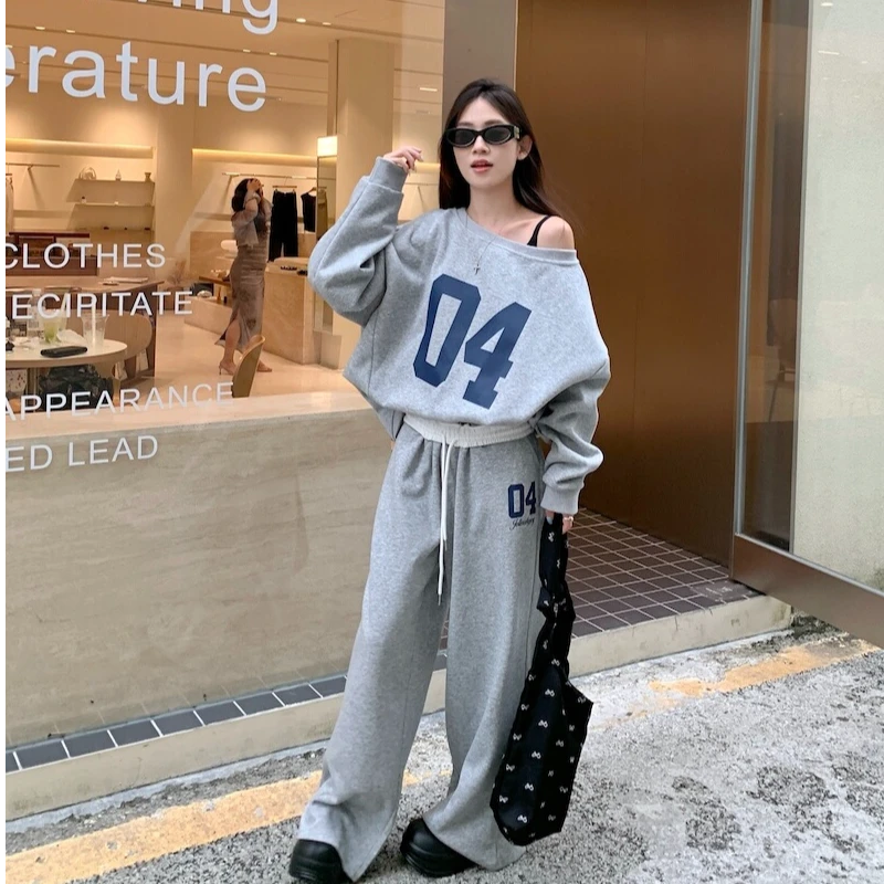 早秋穿搭套装女宽松印花长袖斜肩卫衣抽绳阔腿裤休闲运动风两件套