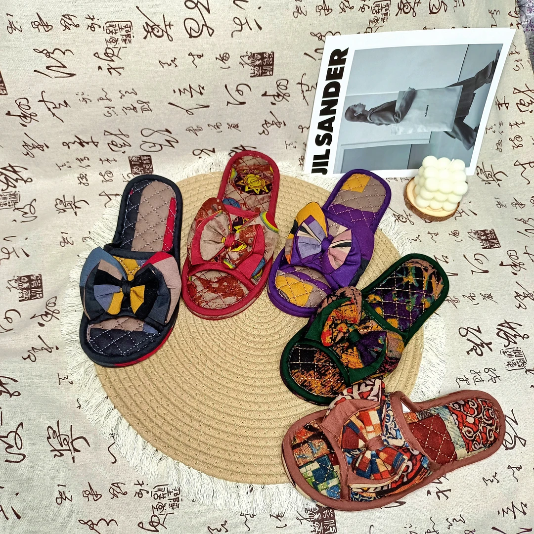 新款布艺三层布底静音男女软底情侣蝴蝶结家居室内四季纯棉布拖鞋