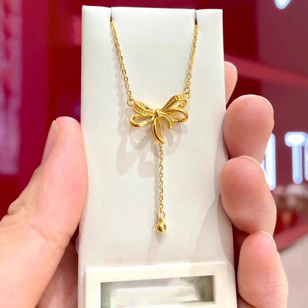 铜合金项链新款蝴蝶结流苏小圆珠项链甜美吊坠金色2024新款简