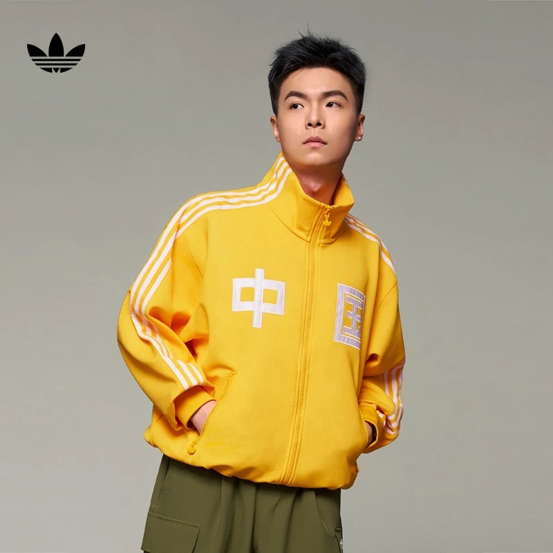 阿迪达斯官方三叶草男女宽松运动夹克外套-正面印中国二字 JG3778
