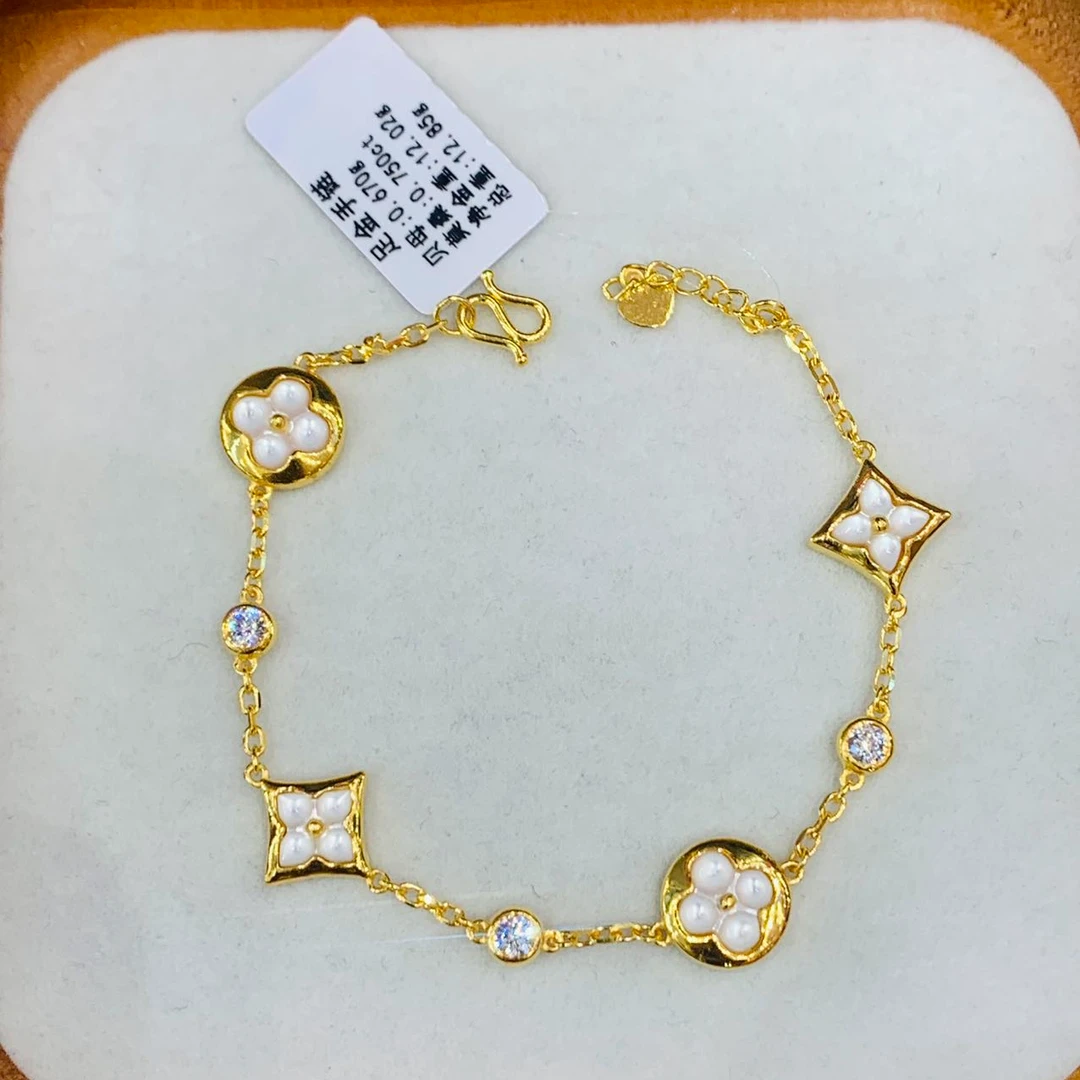 《禧缘黄金》足金999  老花白贝母花莫桑点手链