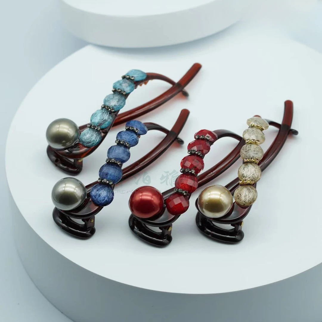 轻奢气质带钻珍珠扭扭夹高级感盘发一字发夹女2024新款后脑勺抓夹