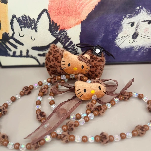 可爱毛绒豹纹蝴蝶结手机背夹