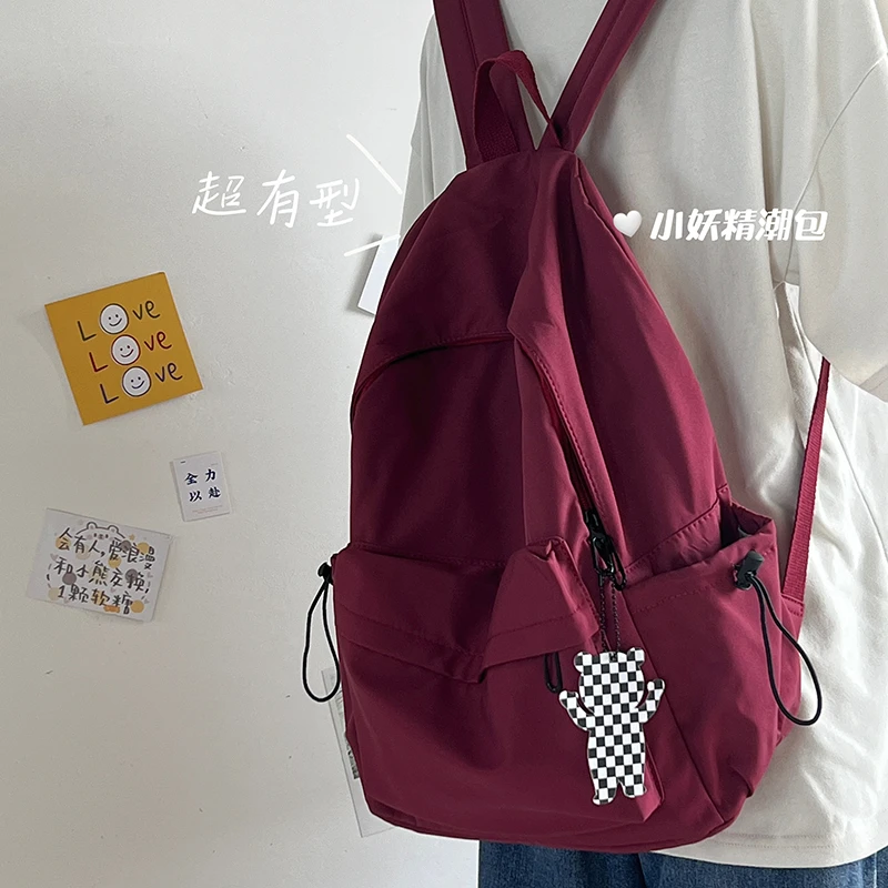 YIFEIERTE/伊飞尔特超坠感书包女简约双肩包初中高中学生韩版背包