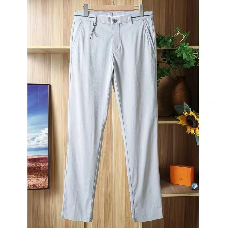 N400P 小挂件装饰春季弹力舒爽透气休闲中腰男士裤子（卡码拍大）