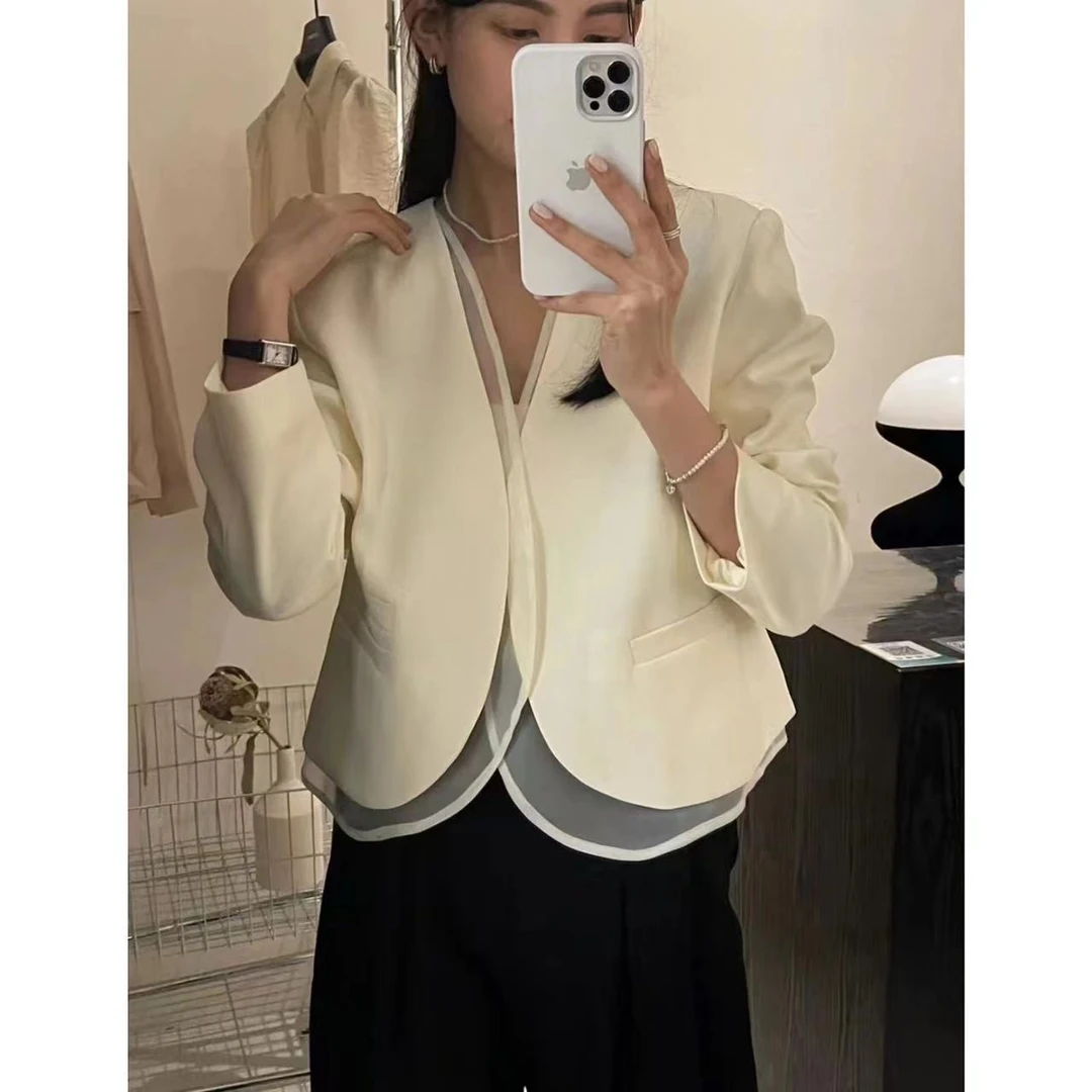 小静折扣~N1222P  无扣欧根纱拼接衣摆长袖小香风外套（卡码拍大）