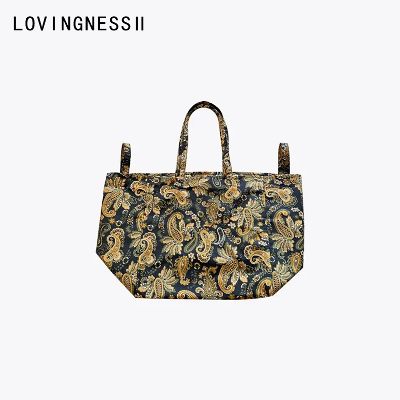 2024早秋新款小众设计复古腰果花大容量通勤手提单肩托特大包女