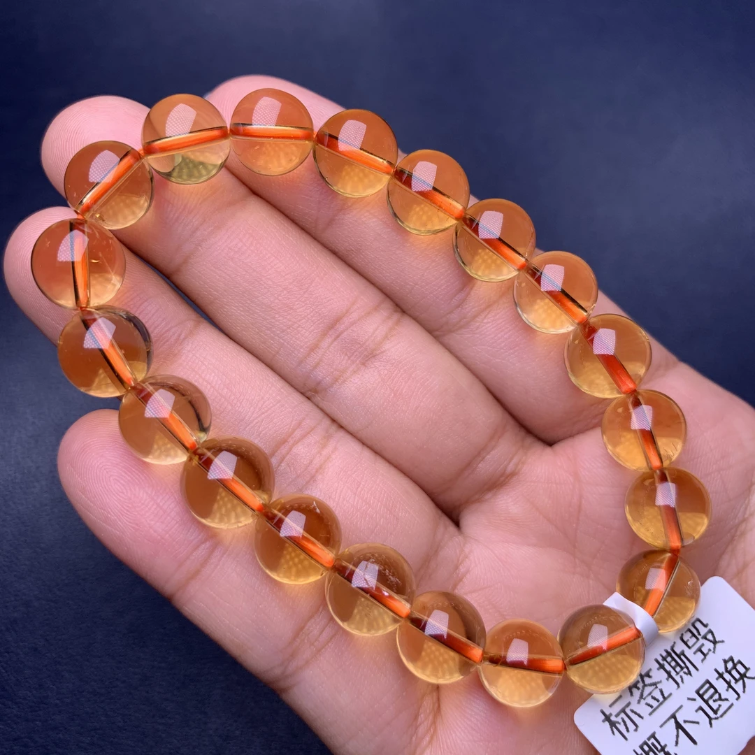 天然巴西黄水晶手链女暴力黄通透金橘黄晶手串近净体通透抖音质检